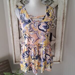 Kathy Ireland Women's Sleeveless Criss Cross V-Neck Ruffle Hem Tank Top in Geo